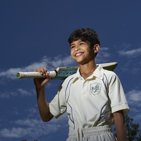 Child Playing Cricket