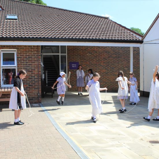 girls from a private school in Surrey skipping with skipping ropes