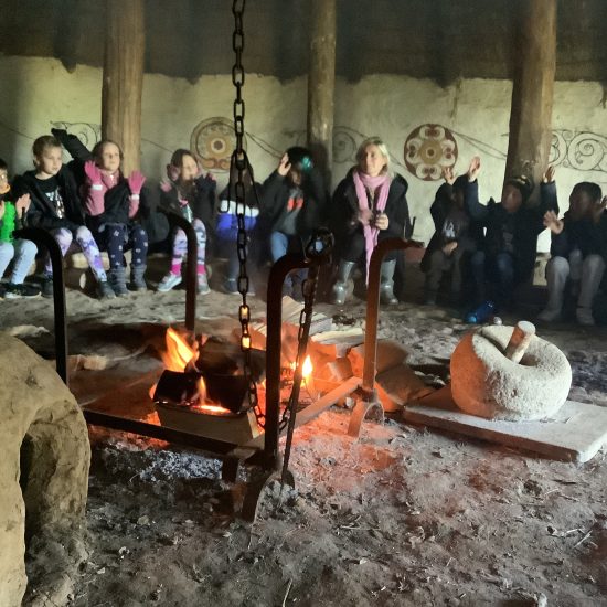 Students look at how people remained warm and cooked for themselves