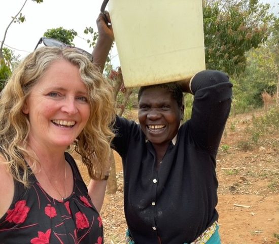 Mrs Miles with a Malawi resident