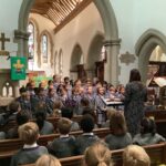 children singing in a church