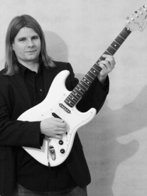 Ryan Marsh playing electric guitar